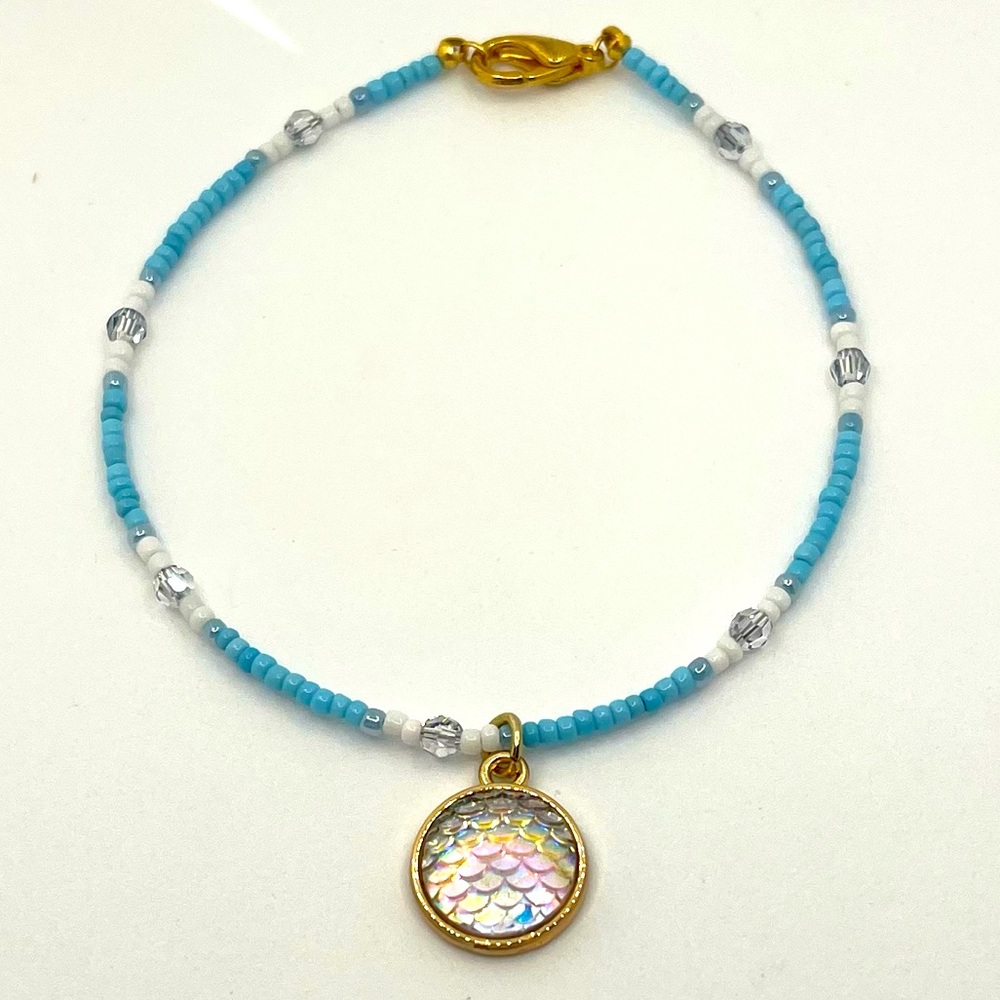 Anklet- Swarovski Crystals, light blue & white glass bead and Mermaid gold charm